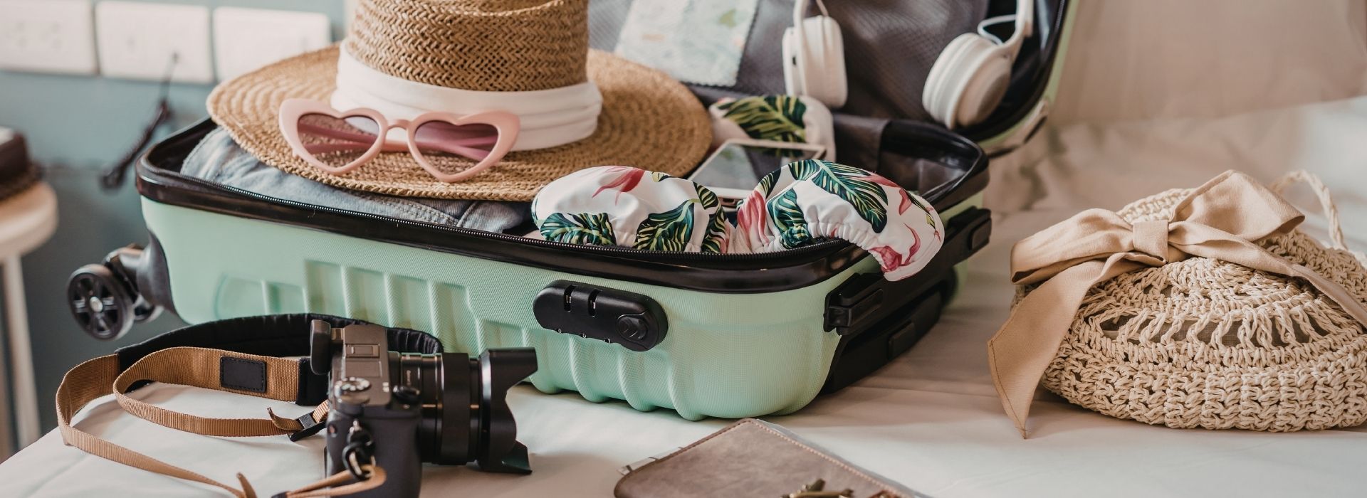 Packed suitcase with travel essentials for safari